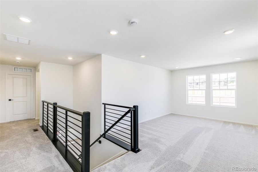 Spacious, unfurnished interior of a new home in Terrain Oak Valley, Castle Rock (Image 28).