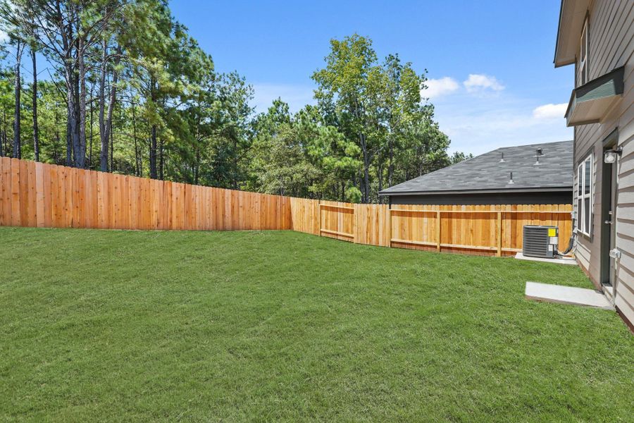 Exterior details and patio area of a home in McCrorey Trails, Conroe (Image 2). Exterior details and patio area of a home in McCrorey Trails, Conroe (Image 2).
