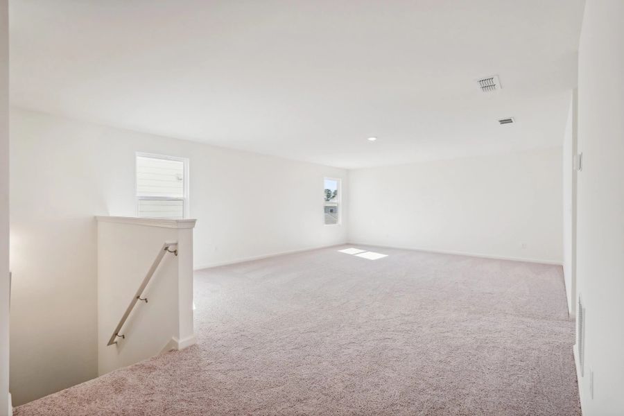 Representative unfurnished interior of a home built from the Eris by Starlight Homes in Brookshire at Legacy Hills, Celina (Image 20). Representative unfurnished interior of a home built from the Eris by Starlight Homes in Brookshire at Legacy Hills, Celina (Image 20).