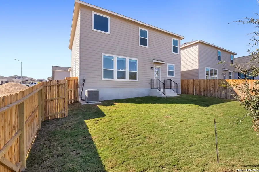 Exterior details and patio area of a home in Knox Ridge, Converse (Image 4).