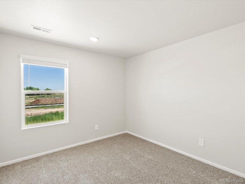 Spacious, unfurnished interior of a new home in Poudre Heights: The Lakes Collection, Windsor (Image 31).