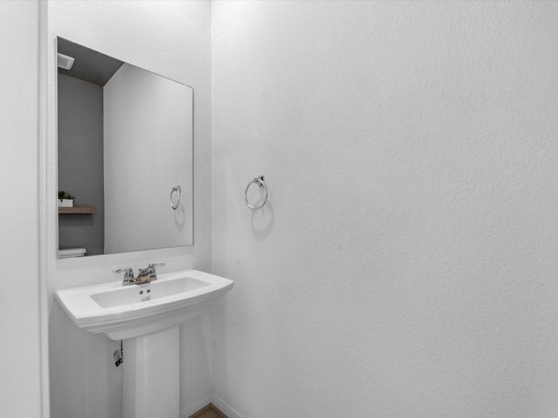 Half bathroom downstairs. Half bathroom downstairs.