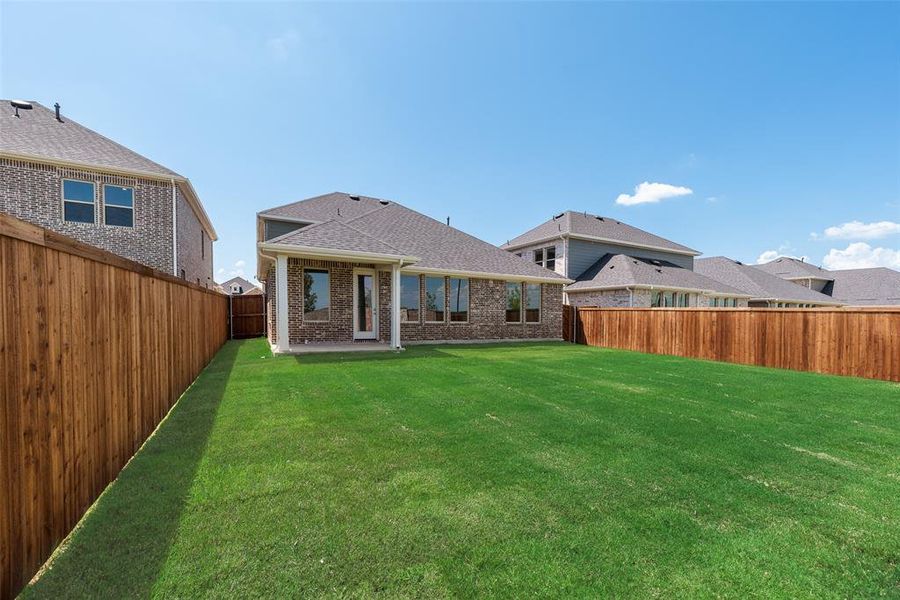 Exterior details and patio area of a home in Arbors at Legacy Hills, Celina (Image 20).