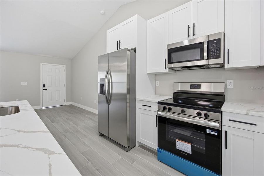 Furnished interior view inside a new home in , Citrus Springs (Image 12).