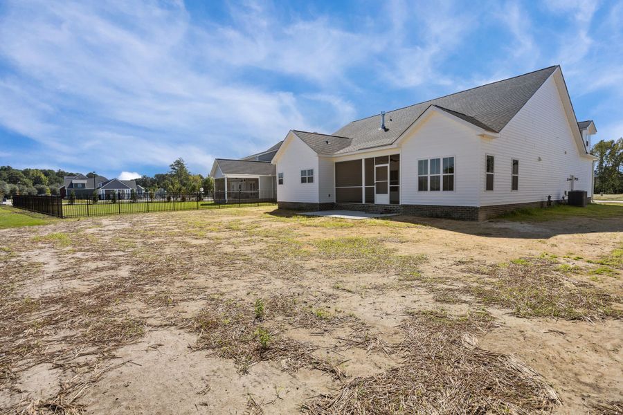 Exterior details and patio area of a home in The Preserve at Langston, Winterville (Image 30).