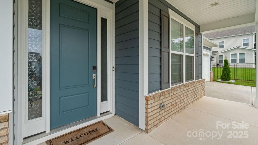 Front exterior of a new home in , Fort Mill, SC, highlighting curb appeal (Image 22).