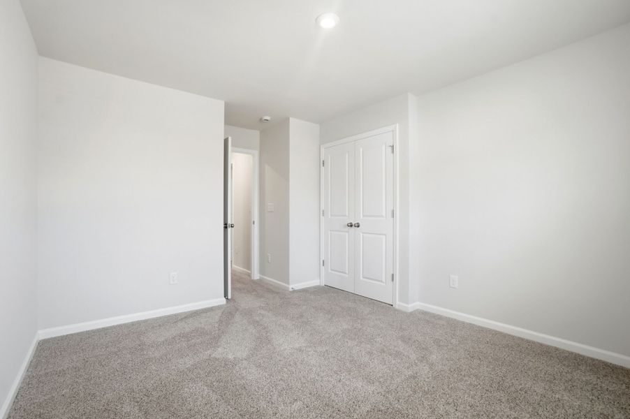 Spacious, unfurnished interior of a new home in Stonesummit at Reedy Creek, Charlotte (Image 19).