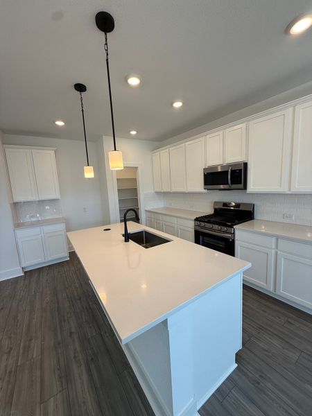 Furnished interior view inside a new home in Sage Collection – Freedom at Anthem, Kyle (Image 4). Furnished interior view inside a new home in Sage Collection – Freedom at Anthem, Kyle (Image 4).