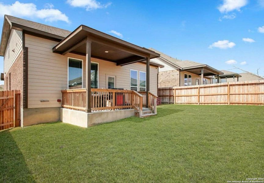 Exterior details and patio area of a home in Bricewood, San Antonio (Image 24).