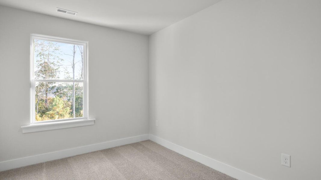Spacious, unfurnished interior of a new home in Indigo Preserve Townhomes, Leland (Image 26).