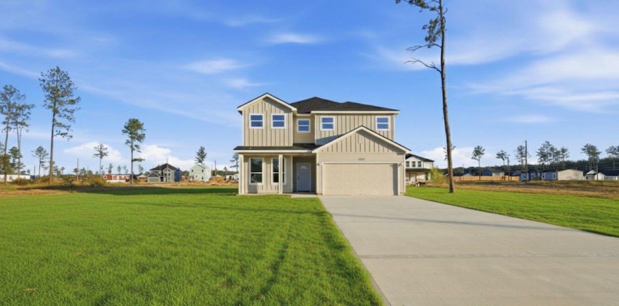 Front exterior of a new home in , Conroe, TX, highlighting curb appeal (Image 2). Front exterior of a new home in , Conroe, TX, highlighting curb appeal (Image 2).