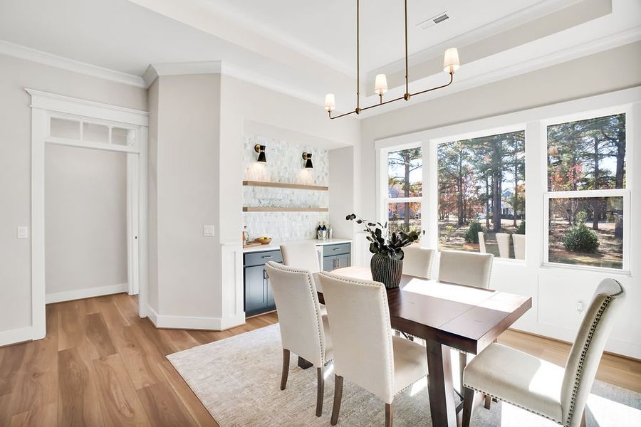 Furnished interior view inside a new home in The Bluffs On the Cape Fear, Leland (Image 18).