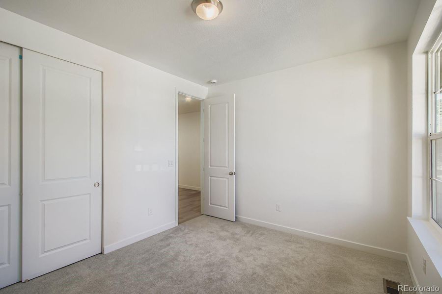 Spacious, unfurnished interior of a new home in Ken-Caryl Ranch: The Monarch Collection, Littleton (Image 7).