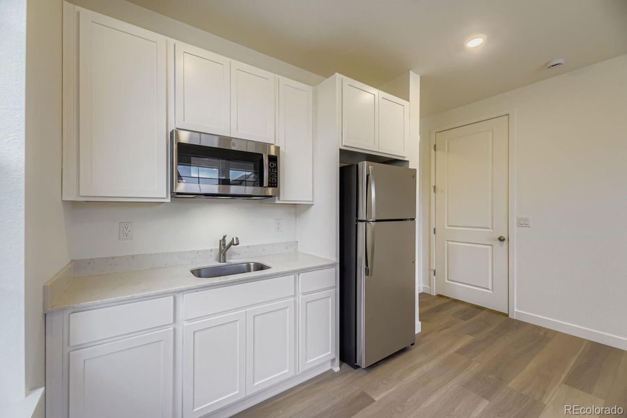 Furnished interior view inside a new home in Ken-Caryl Ranch, Littleton (Image 5).