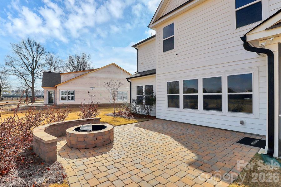 Exterior details and patio area of a home in Stonebridge Fairways, Monroe (Image 25).
