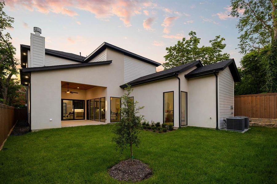Contemporary exterior with a covered patio featuring a wood-finish ceiling and integrated lighting