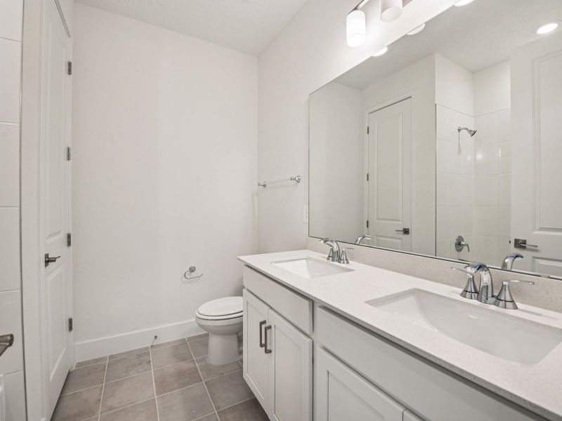Furnished interior view inside a new home in Legends Preserve - Signature Series, Daytona Beach (Image 6).