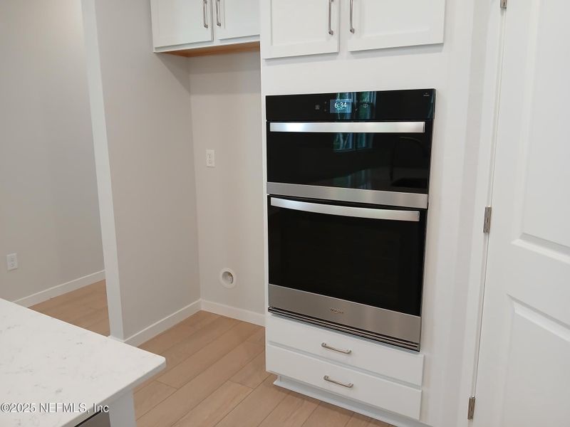 Furnished interior view inside a new home in The Preserve at Concourse Crossing, Fernandina Beach (Image 5).