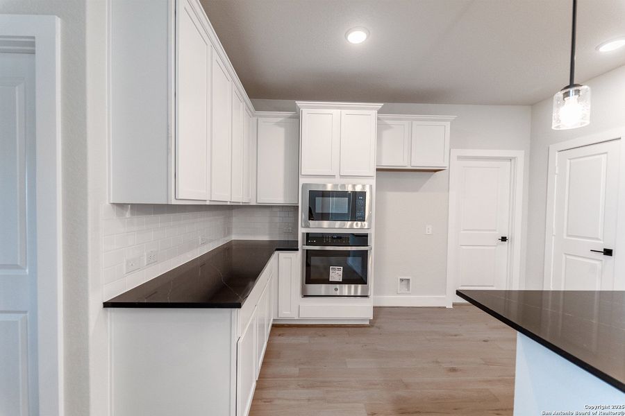 Furnished interior view inside a new home in The Woodlands at Medina Hills, Mico (Image 3).