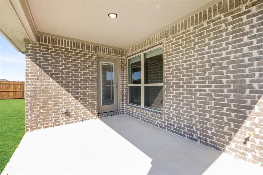 Exterior details and patio area of a home in Waterscape Classic 60s, Royse City (Image 3). Exterior details and patio area of a home in Waterscape Classic 60s, Royse City (Image 3).