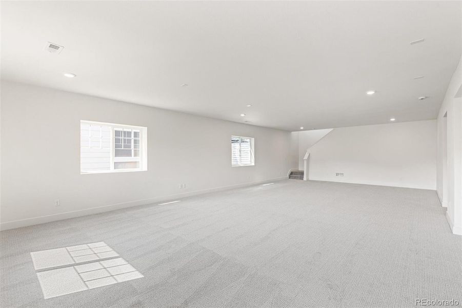 Spacious, unfurnished interior of a new home in Terrain Oak Valley, Castle Rock (Image 26).