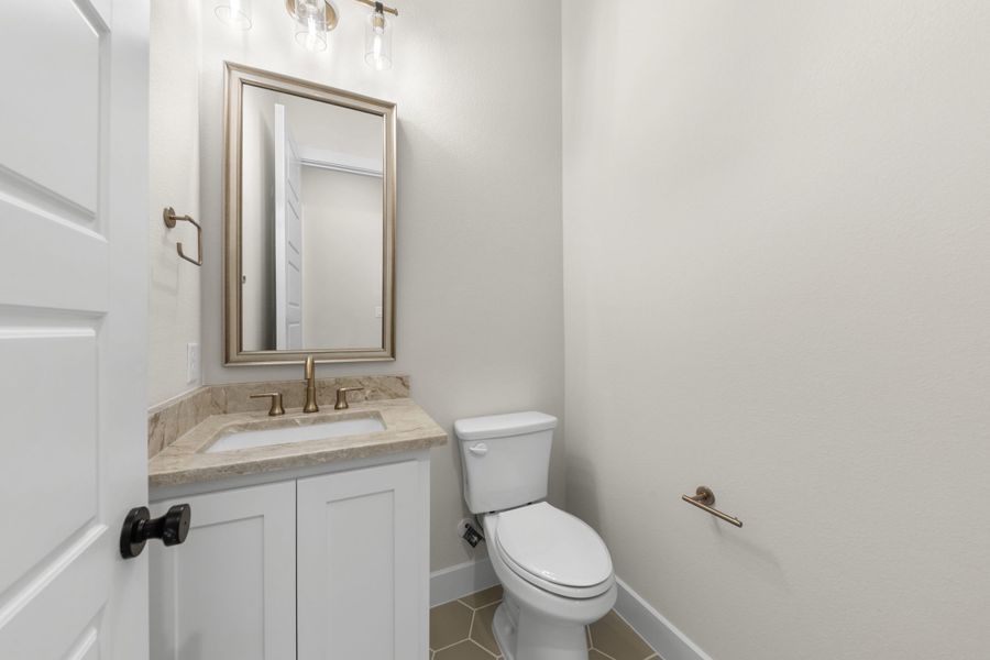 Representative furnished interior of a home built from the 5511 by Tradition Homes in Mustang Lakes, McKinney (Image 5).