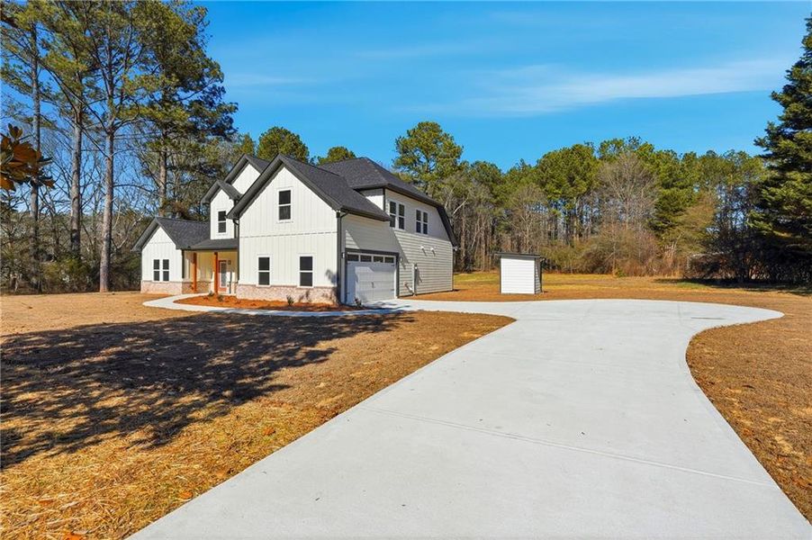 Front exterior of a new home in , Hampton, GA, highlighting curb appeal (Image 22). Front exterior of a new home in , Hampton, GA, highlighting curb appeal (Image 22).