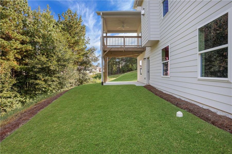 Front exterior of a new home in Cambridge, Flowery Branch, GA, highlighting curb appeal (Image 21). Front exterior of a new home in Cambridge, Flowery Branch, GA, highlighting curb appeal (Image 21).