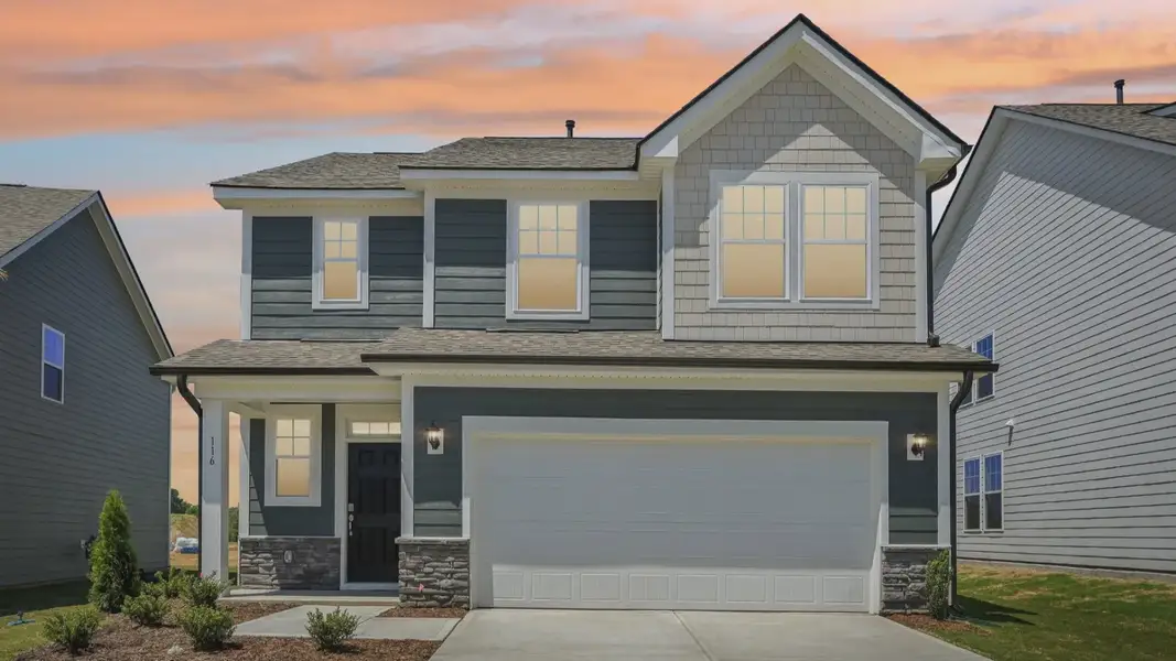 Front exterior of a new home in Sidney Creek Single Family, Zebulon, NC, highlighting curb appeal (Image 2). Front exterior of a new home in Sidney Creek Single Family, Zebulon, NC, highlighting curb appeal (Image 2).