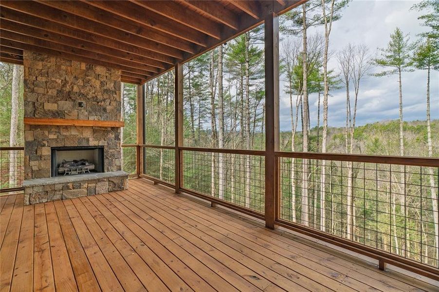 Exterior details and patio area of a home in , Ellijay (Image 13).