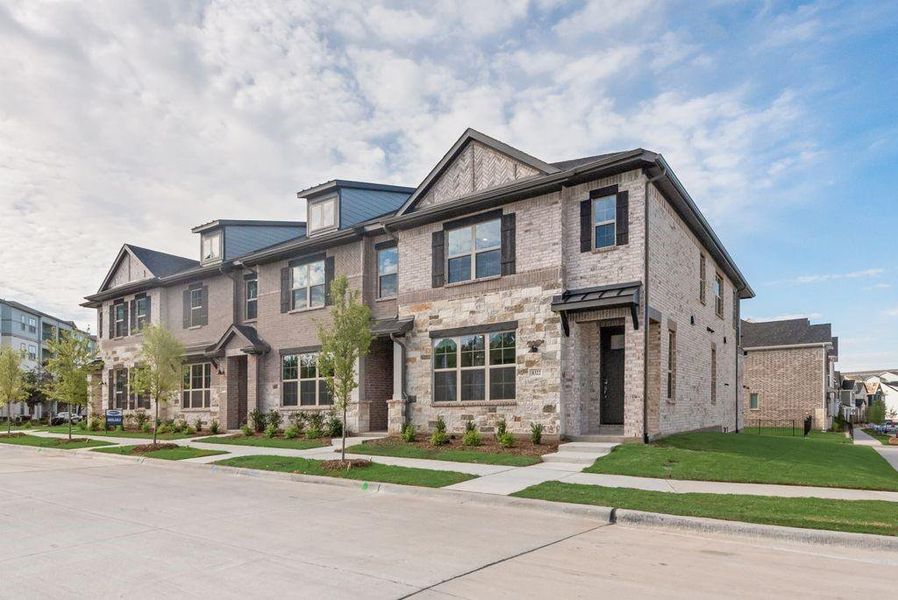 Front exterior of a new home in Bayside, Rowlett, TX, highlighting curb appeal (Image 18).