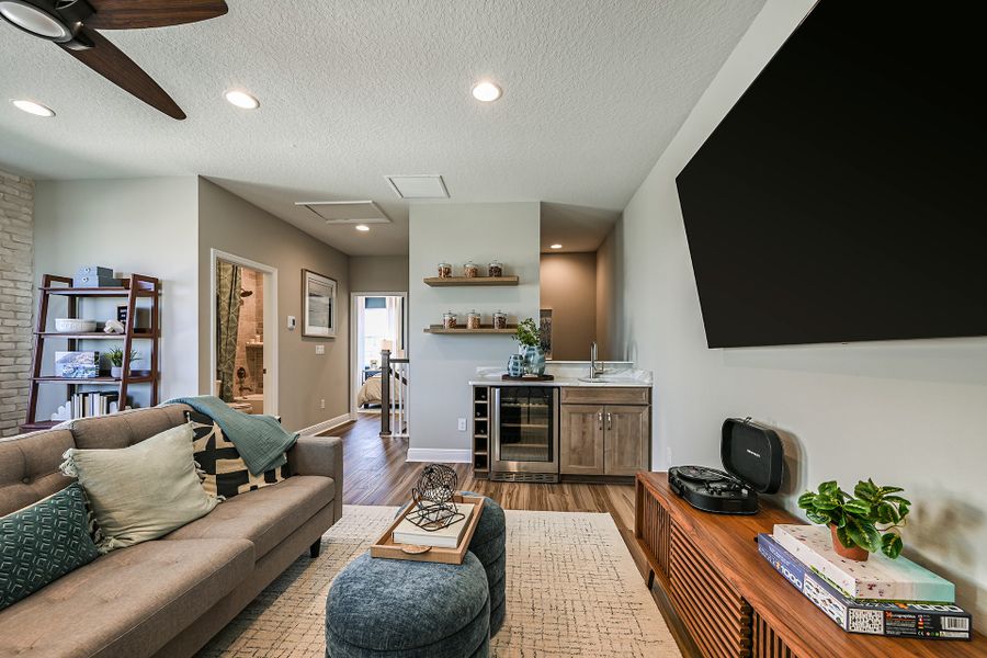 Representative furnished interior of a home built from the Biscayne II by Homes by WestBay in Oakfield, Parrish (Image 18).