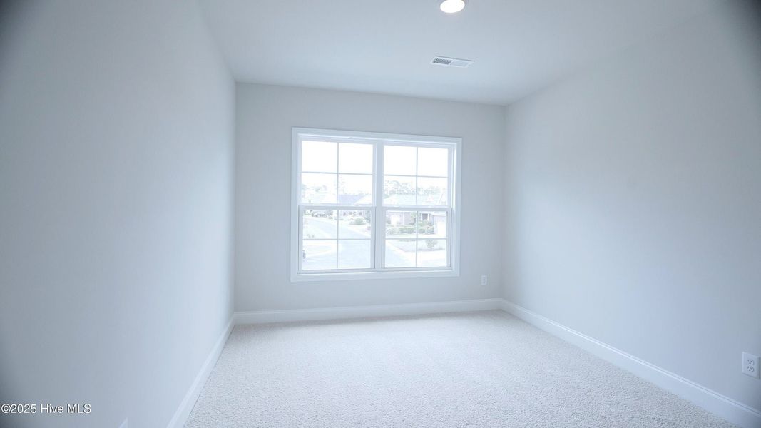 Spacious, unfurnished interior of a new home in Palmetto Creek, Bolivia (Image 22).