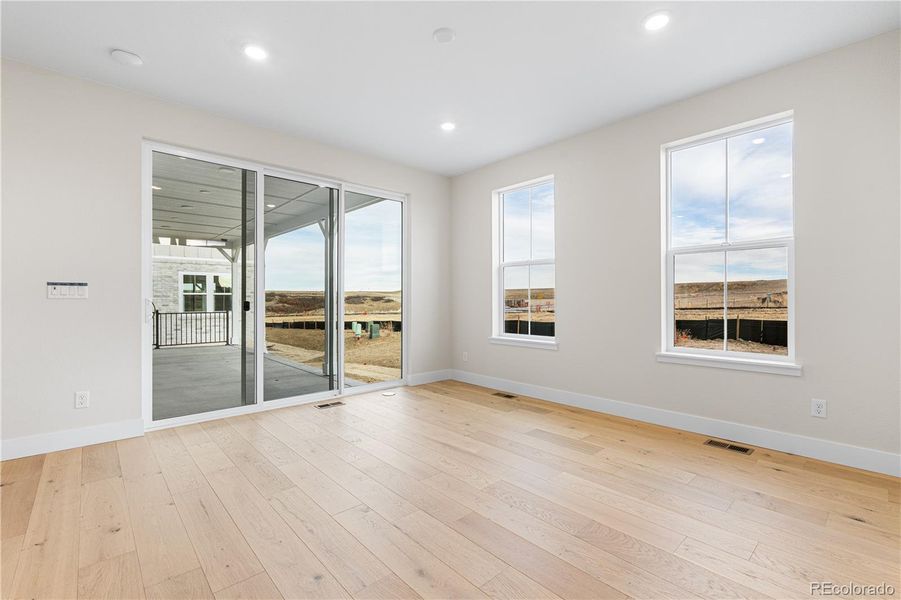Spacious, unfurnished interior of a new home in Luxe at The Canyons, Castle Pines (Image 47).