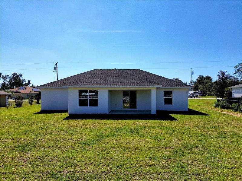 Exterior details and patio area of a home in , Ocala (Image 41).