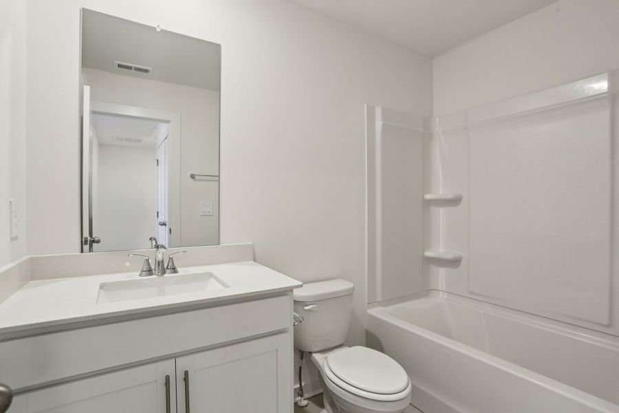 Furnished interior view inside a new home in Greystone - Highland Townhomes, Smyrna (Image 8).