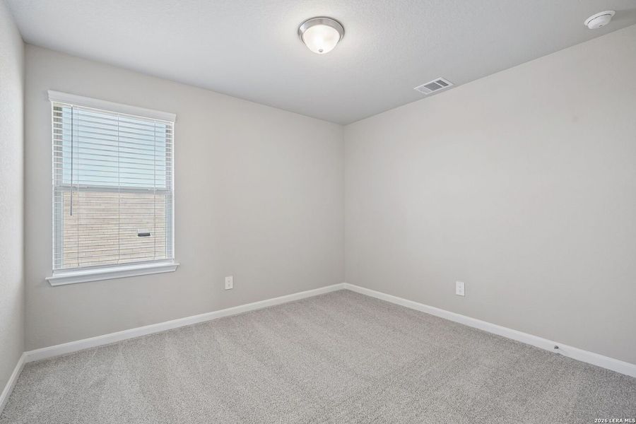 Spacious, unfurnished interior of a new home in Remington Ranch, San Antonio (Image 36).