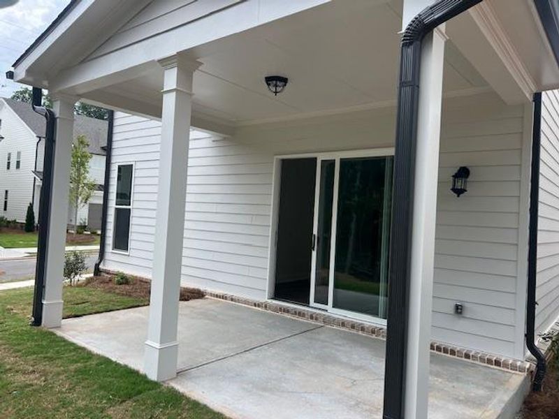 Exterior details and patio area of a home in Palisades Single Family, Cumming (Image 3). Exterior details and patio area of a home in Palisades Single Family, Cumming (Image 3).