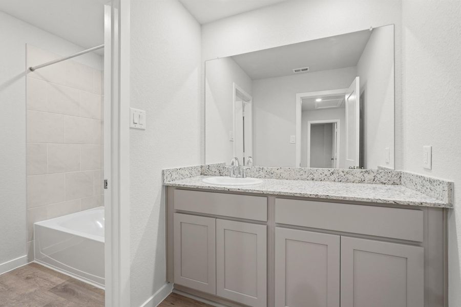 Furnished interior view inside a new home in Crockett Meadows, Conroe (Image 9).