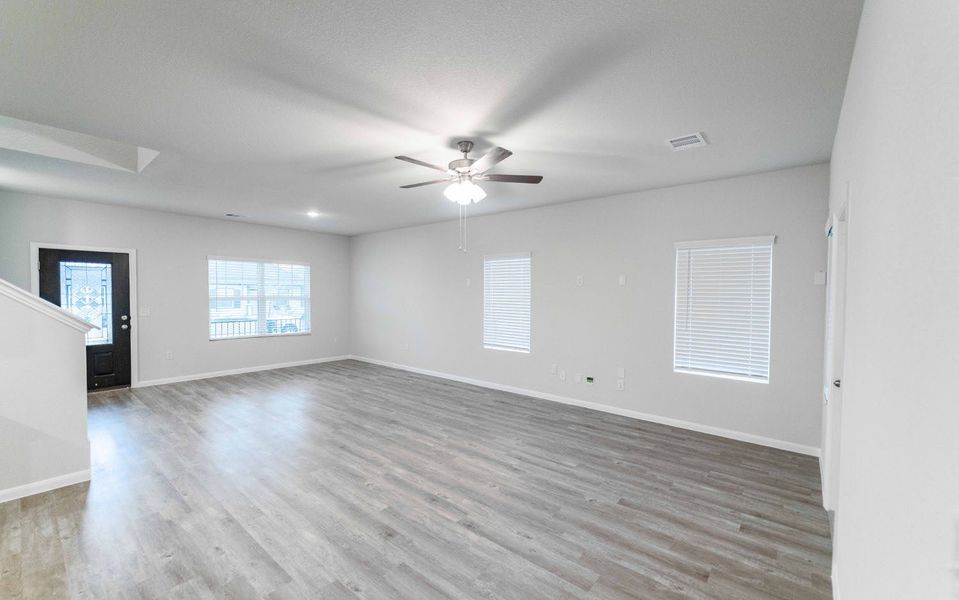 Spacious, unfurnished interior of a new home in Brooklands, Hutto (Image 10).