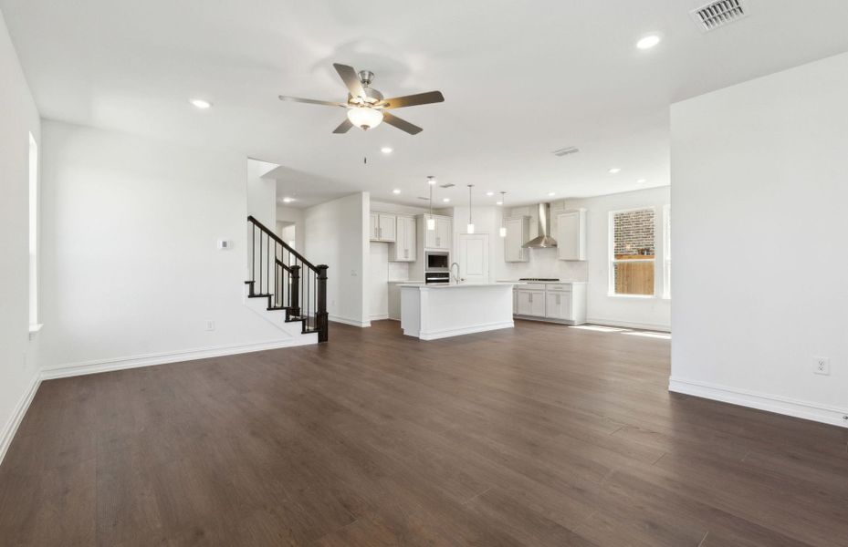 Open concept gathering room creating a spacious and inviting atmosphere Open concept gathering room creating a spacious and inviting atmosphere