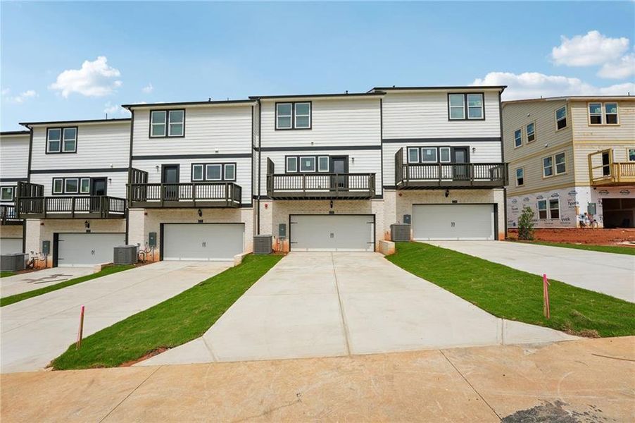 Front exterior of a new home in Hemingway - Highland Series, Cumming, GA, highlighting curb appeal (Image 28).