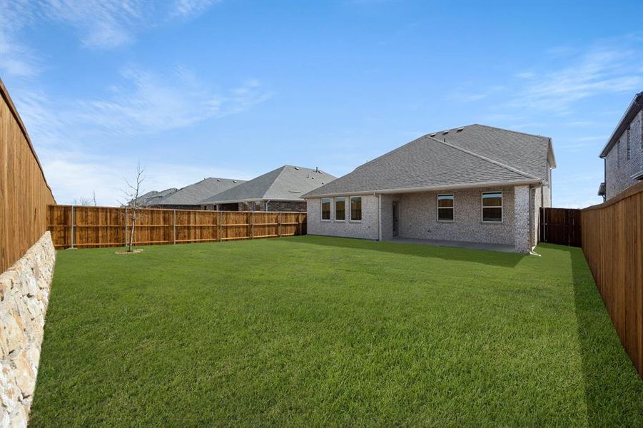 Exterior details and patio area of a home in Wildflower Ranch, Fort Worth (Image 3).
