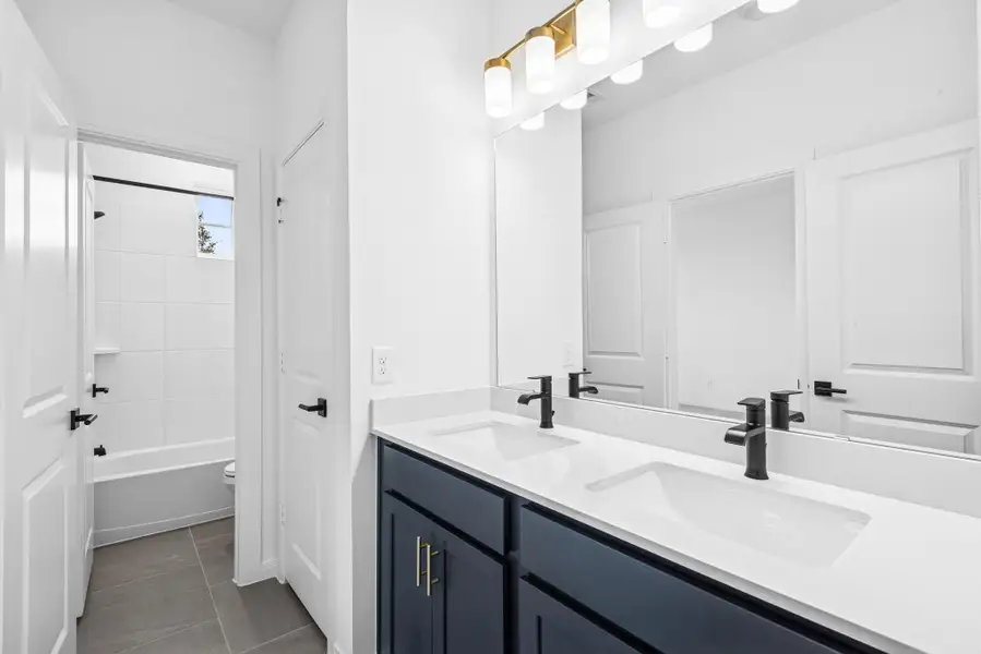 Furnished interior view inside a new home in The Grand Prairie 50’, Hockley (Image 5).