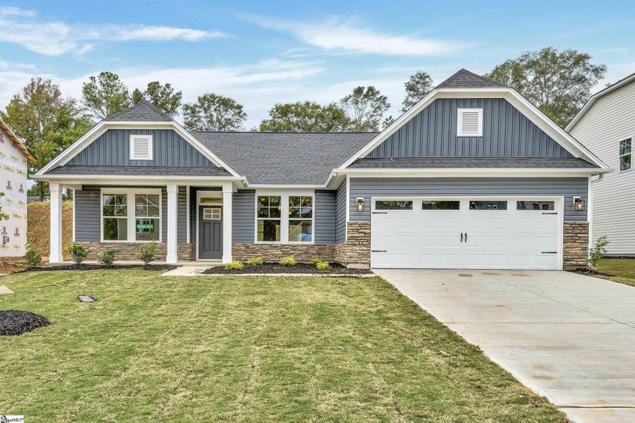 Front exterior of a new home in Lynbrook, Boiling Springs, SC, highlighting curb appeal (Image 1).