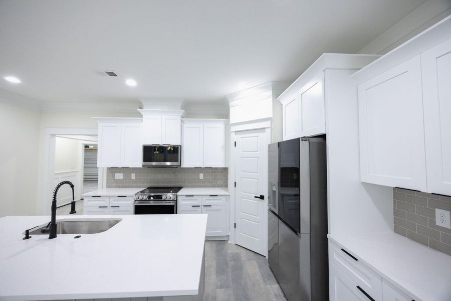 Furnished interior view inside a new home in , North Charleston (Image 7).