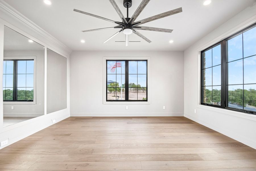 Spacious, unfurnished interior of a new home in The Overlook at Westlake, Austin (Image 24).