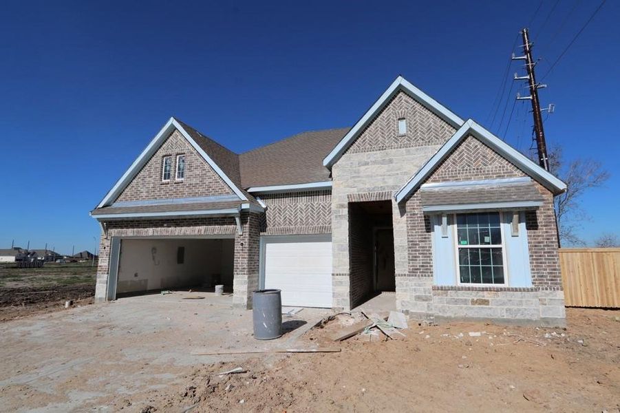 In-progress construction of a new home in Meridiana 55' Homesites, Manvel, TX (Image 6).