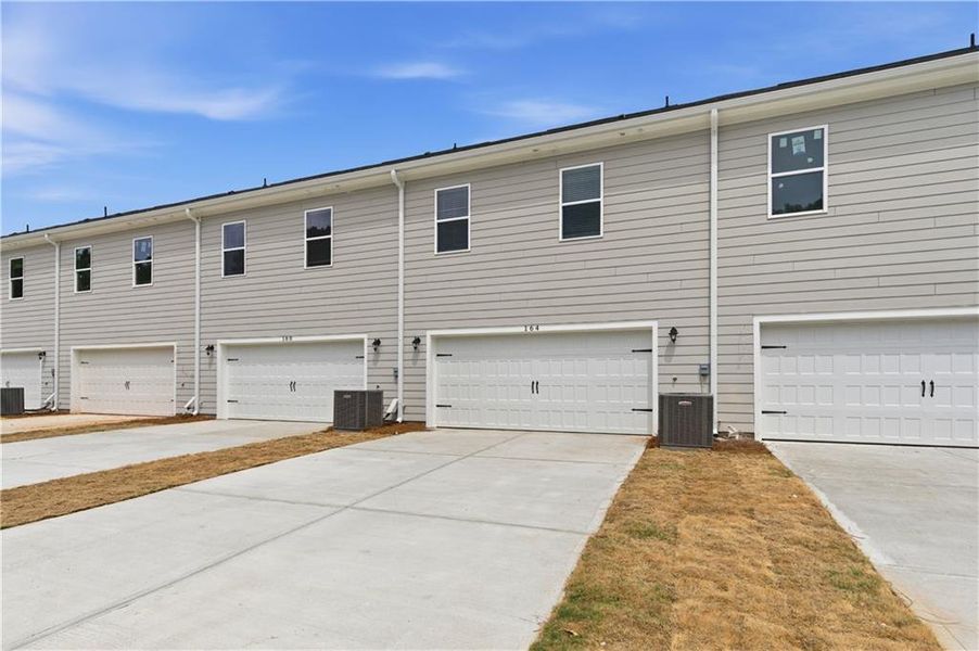 Exterior details and patio area of a home in Avery Landing, McDonough (Image 19).