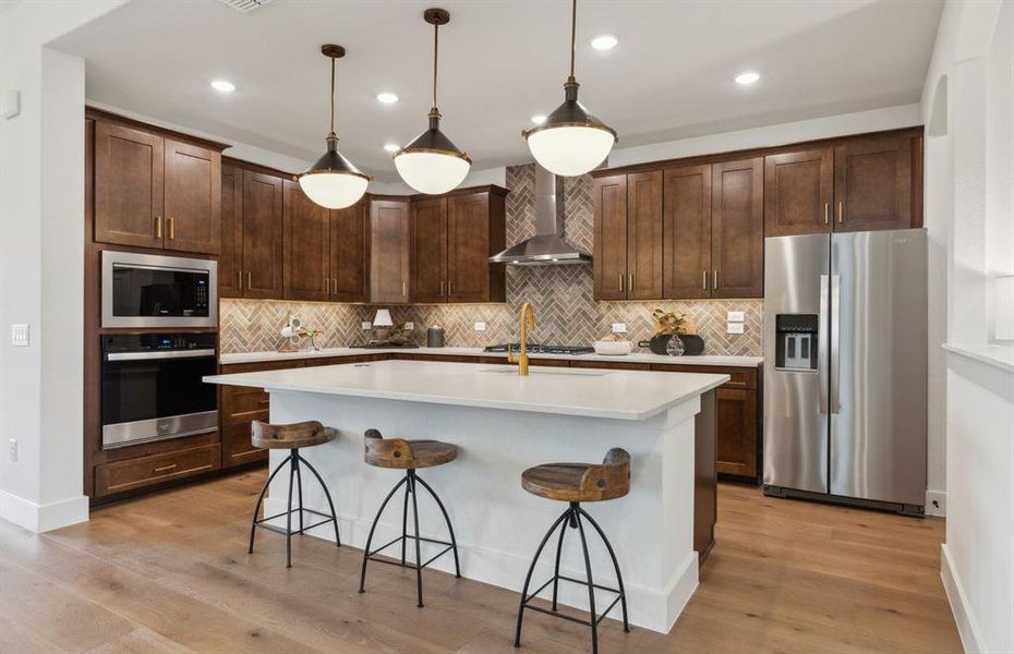 *Model Representation - Spacious kitchen with eat-in bartop island